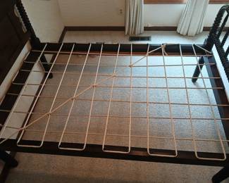 The antique bed's roping