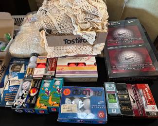 nib golf balls. vintage crochet linens