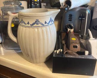 old pottery carafe