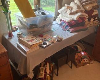 sewing fabric and notions, lots of afghans.