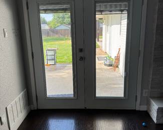 French doors with mini blinds btw glass $150