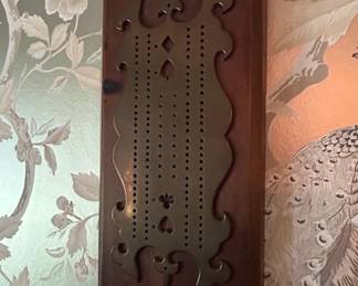 Vintage Wooden Cribbage Board with Ornate Brass Overlay and Decorative Cutouts second image