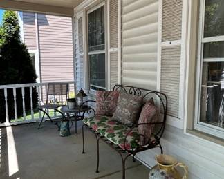Wrought Iron Garden Bench with Floral Cushions