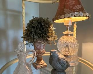VictorianStyle Crystal Decanter, Lamp with ButtonAdorned Shade, Distressed Urn, and Bird Figurine