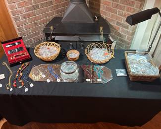 Over 100 pieces of costume jewelry. Several sterling and a few gold, some vintage including watches, bracelets and holiday.