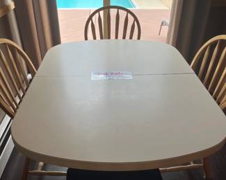 Kitchen table (with leaf) 4 chairs & cushions