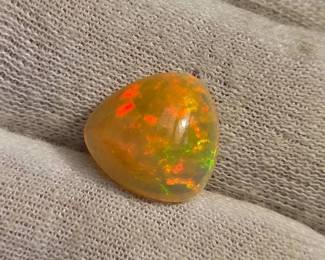 4.37 Carat Natural Welo Opal Cabochon
