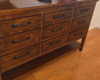 Brown Wood Dresser with Black Pulls