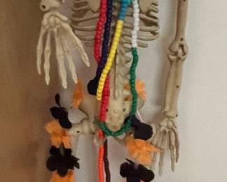 Plastic Posable Skeleton Halloween Decoration with Beads and Garland