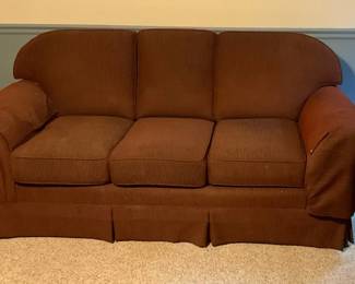 Red Cushioned Sofa