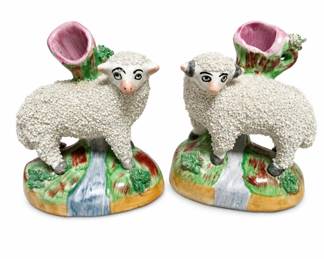 Lot 387: Pair of William Kent Staffordshire Sheep Spill Vases