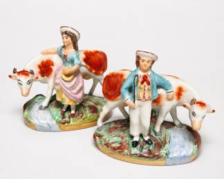 Lot 446: Pair of Staffordshire-Style Pottery Cow & Figure Groups