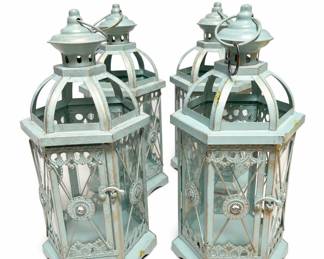 Lot 287: Set of 4 Pier 1 Distressed Metal Candle Lanterns