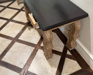 Tuscan carved console / writing desk. Stunning architectural carved base with a contrasting ebony top. Two working drawers. Heavy, solid wood construction with beautifully-intricate hand-carved details. Perfect for an entryway, an office, or a statement piece.