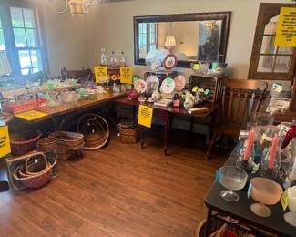 The Dining Room - A collector’s delight, Here you’ll find a gorgeous THOMASVILLE County-style hard rock maple dining set with six chairs, vintage glassware, decorative plates and serving pieces. As well as a wide variety of baskets and men and women’s jewelry.
