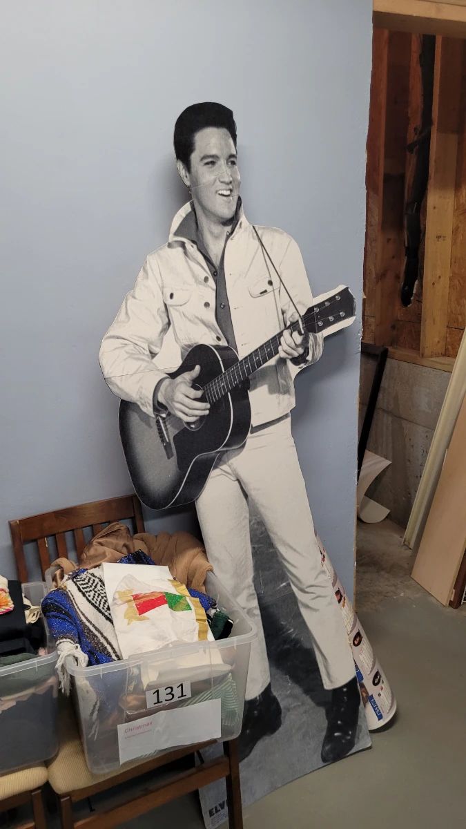 Life Size Stand Up Images of Elvis Presley as well as Donald and Melania Trump "Welcome You to the Sale!"