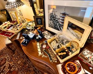 Joan Rivers, Swarovski, Monet, Trifari, Coro, Corocraft, Sarah Coventry, Napier, Avon, Weiss, Kramer, Lisner, BSK, JJ (Jonette Jewelry), Florenza, Hobe, Miriam Haskell, Eisenberg, Anne Klein, Kenneth Jay Lane (KJL), Nolan Miller, Givenchy, Liz Claiborne, Monet-style gold-tone jewelry, vintage rhinestone brooches, faux pearl necklaces, enamel jewelry, cloisonné jewelry, statement necklaces, fashion watches, boxed jewelry gift sets, earrings, bracelets, brooches, pendants, necklaces, rings, and collectible costume jewelry.