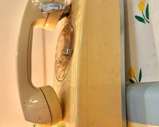 Beige Wall-Mounted Rotary Dial Telephone with Chrome Hook Switch & Coiled Handset Cord