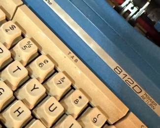 Signature 812D Electric Typewriter in Blue with Red & White Keys and Carrying Case