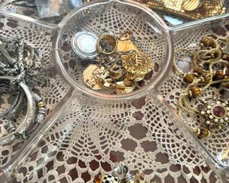 Assorted Gold-Tone & Silver-Tone Costume Jewelry Collection with Charm Bracelets, Pendants, Brooches, Necklaces & Rhinestone Accents
