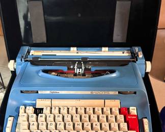 Signature 812D Electric Typewriter in Blue with Red & White Keys and Carrying Case