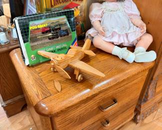 Oak file chest, Lincoln Logs, porcelain doll, wood toys