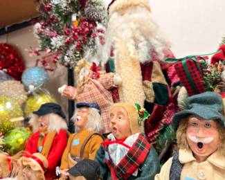 Christmas caroler and Santa figures, holiday decorations