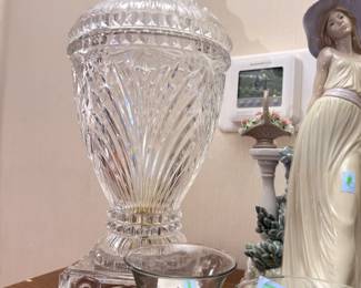 Tall crystal lidded urn and porcelain lady figurine