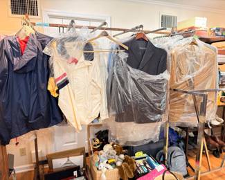 Men's suits, jackets, and clothing on racks