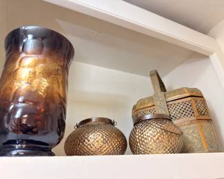 Mercury glass hurricane vase and woven basket lanterns