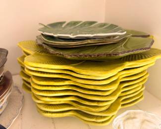 Majolica leaf form plates, yellow and green, stack