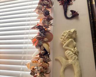 Mermaid wall plaques and seashell decor garland