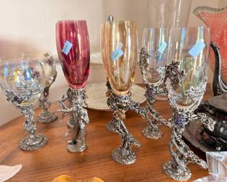 Ornate pewter stem goblets with colored glass, set