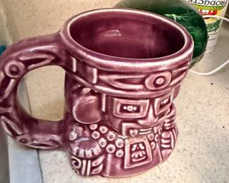 Vintage purple art pottery tiki style mug