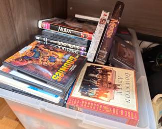 Box lot of DVDs and movies, Mulan, Goonies, Downton Abbey