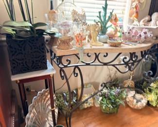 Wrought iron and stone console table, seashell and coral decor