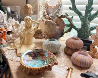 Mermaid figurines, abalone shell, sea urchins, coastal lot