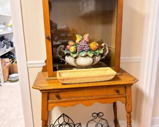 Oak side table with mirror back shelf, wine racks