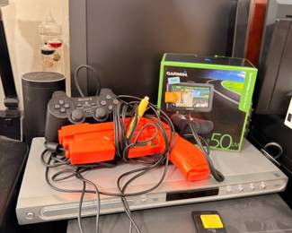 Electronics lot, PlayStation controller, DVD player, Garmin GPS