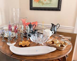 Goldfish watercolor art, cranberry stemware, whale platter