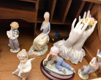 Lladro and Nao style porcelain figurine grouping