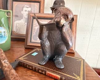 Bronze reading monkey sculpture, antique books and photos