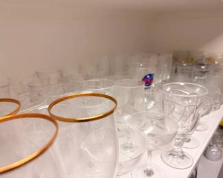 Gold rim glassware and assorted crystal stemware