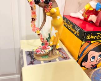 Art Deco style dancer figurine with floral garland