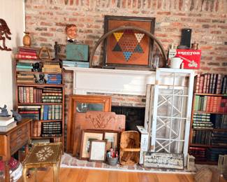 Antique books, Chinese checkers board, mantel display