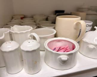 White ironstone pitchers, shakers, and serving pieces