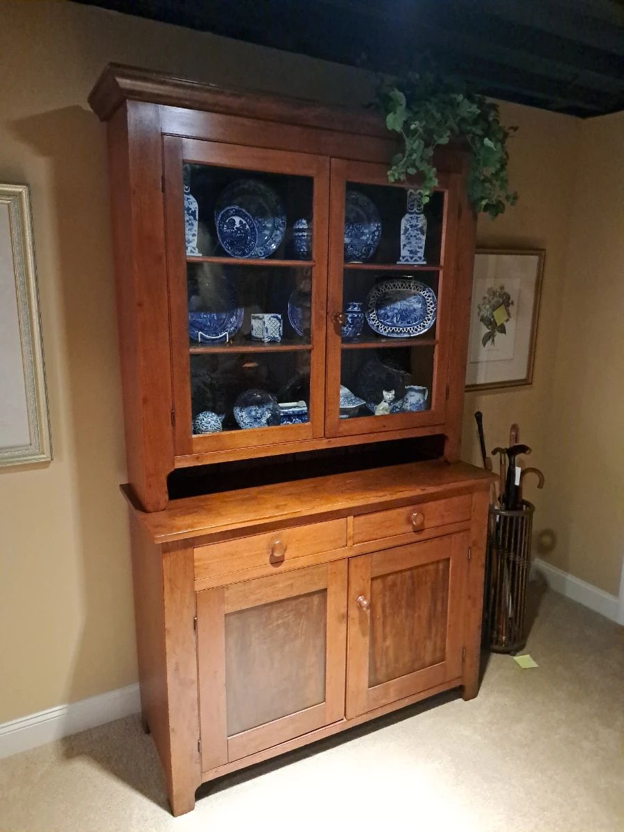 Antique Victorian two part kitchen cupboard filled with flow blue and antique blue and white china.