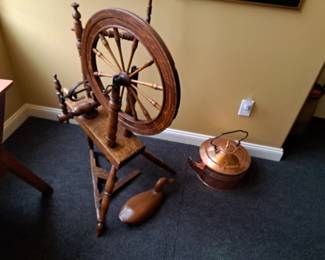 Antique spinning wheel, hand carved decoy and copper kettle.