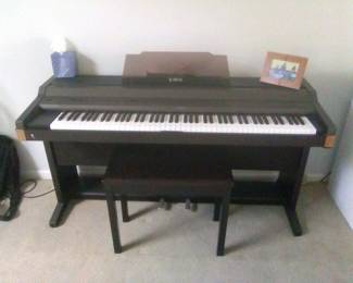 dark wood-finish Kawai digital piano