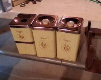 set of vintage mid-century modern stacking kitchen canisters,